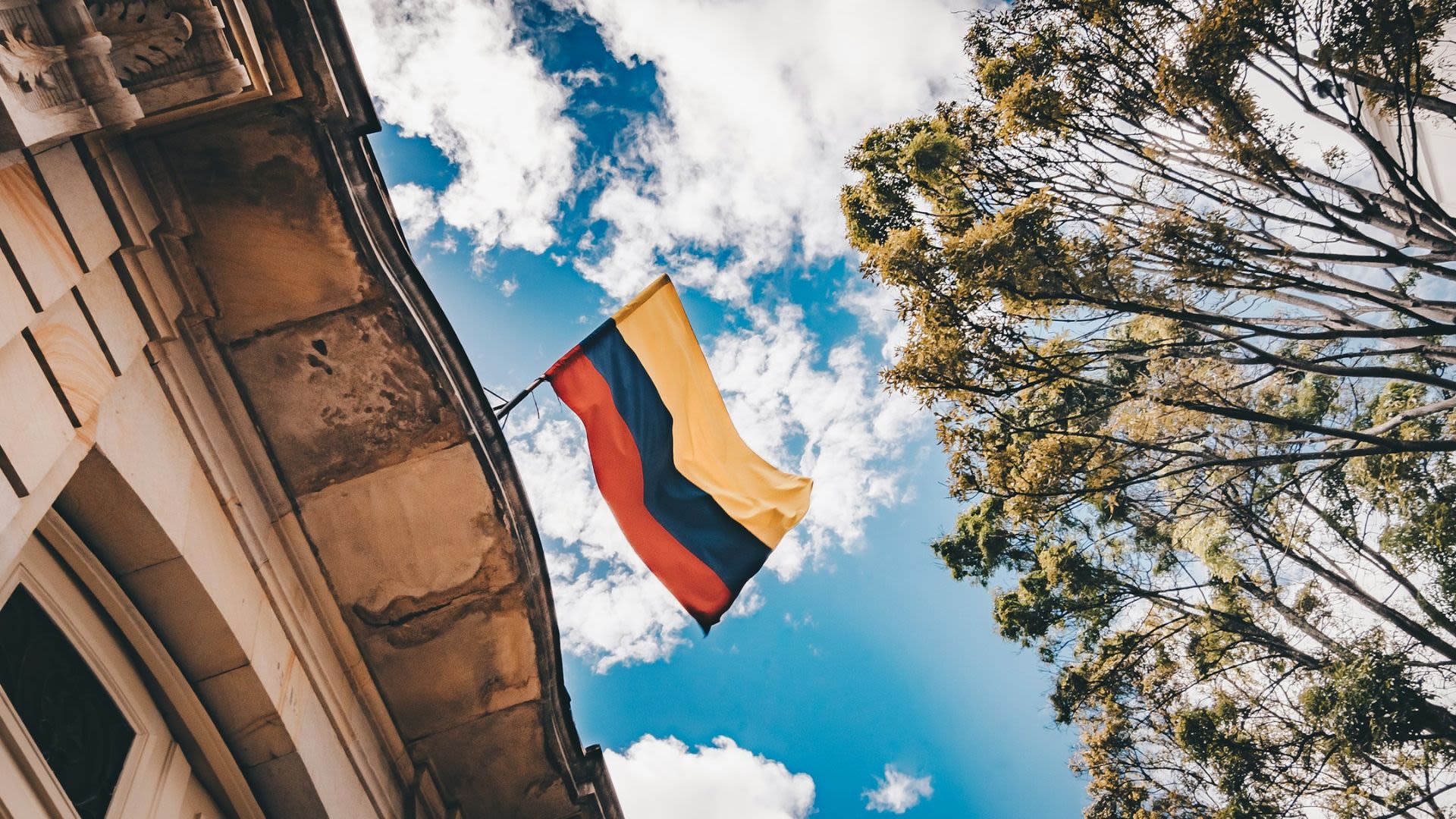Colombia flag flying from rooftop in Bogota Colombia