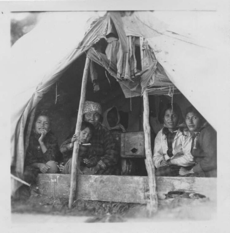 Innu mother and children in tent