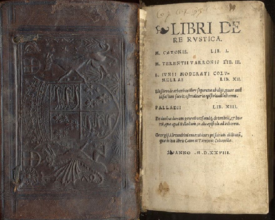 A yellowed book with the title 'Libri de re rustica' and a royal coat of arms embossed in its leather cover.