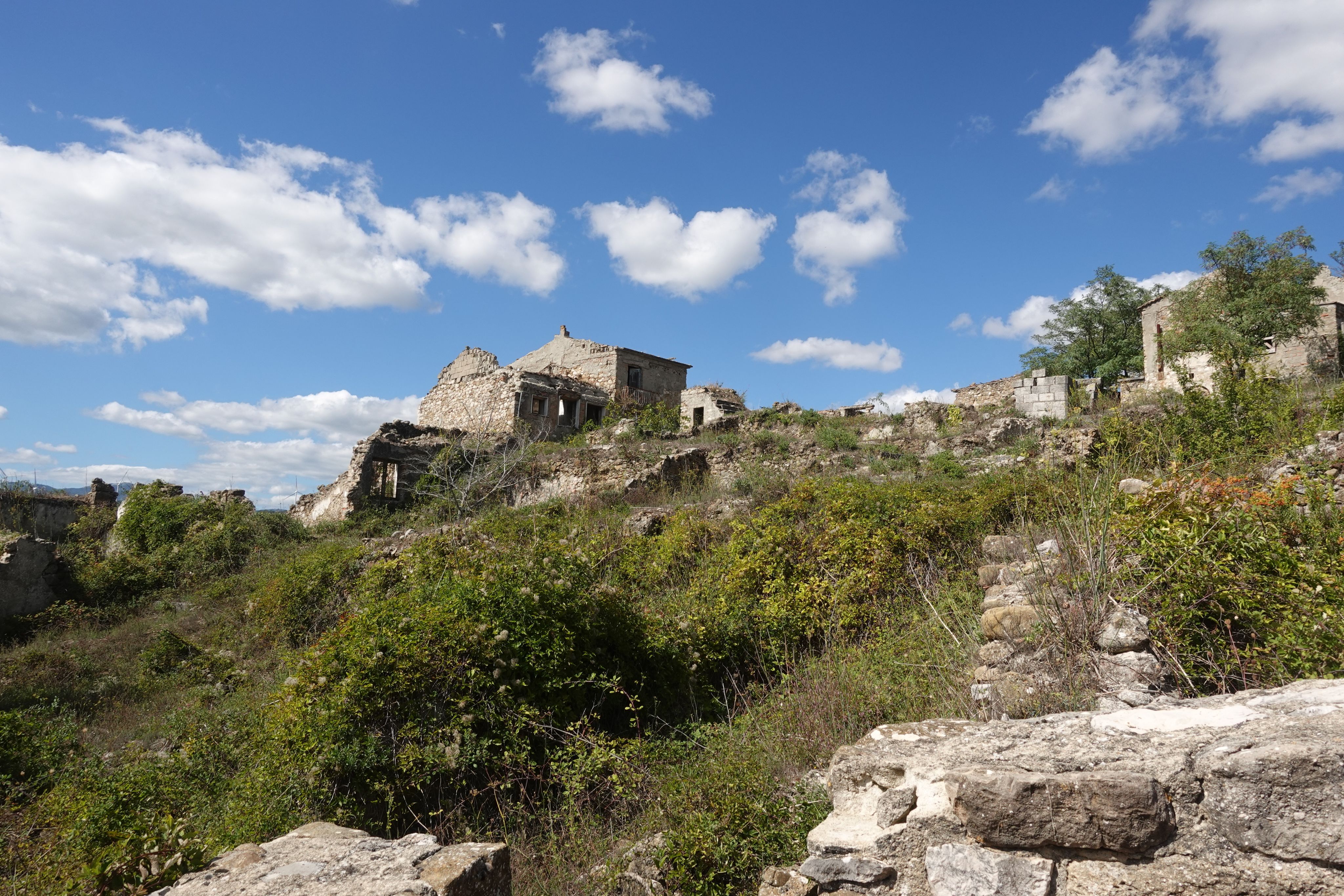A ruined house on a hill.