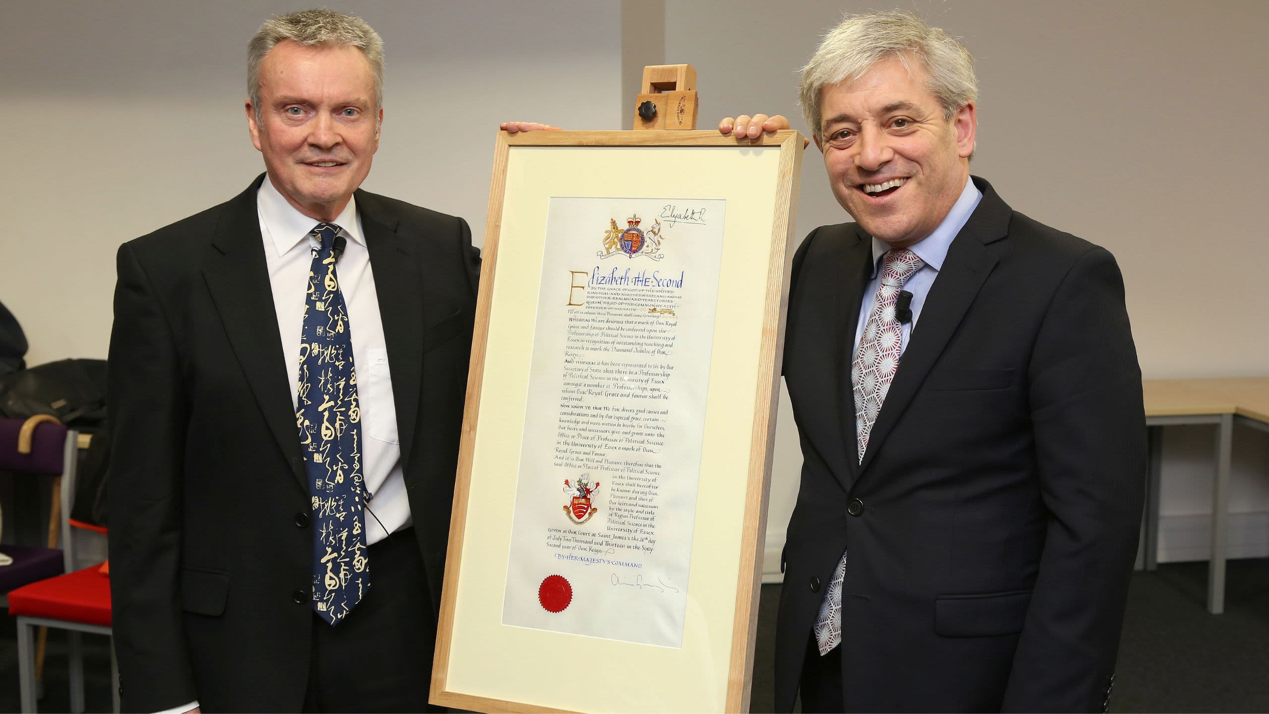 Professor David Sanders and the Rt Hon John Bercow with the framed Regius Professor. award