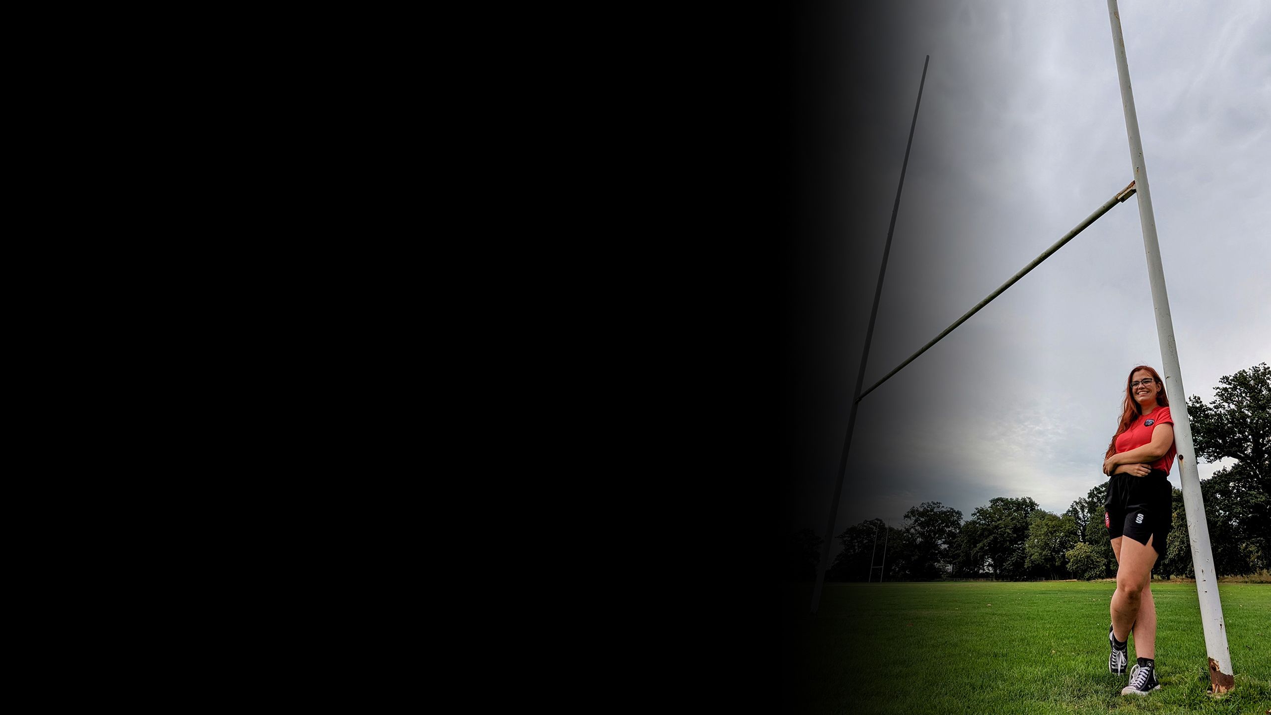 Allie Morris standing by the Rugby posts