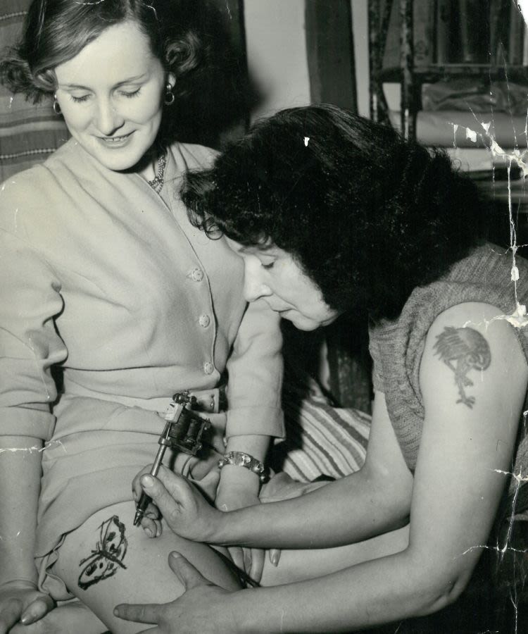 Jessie Knight, tattooing a client, courtesy of the Museum of Wales