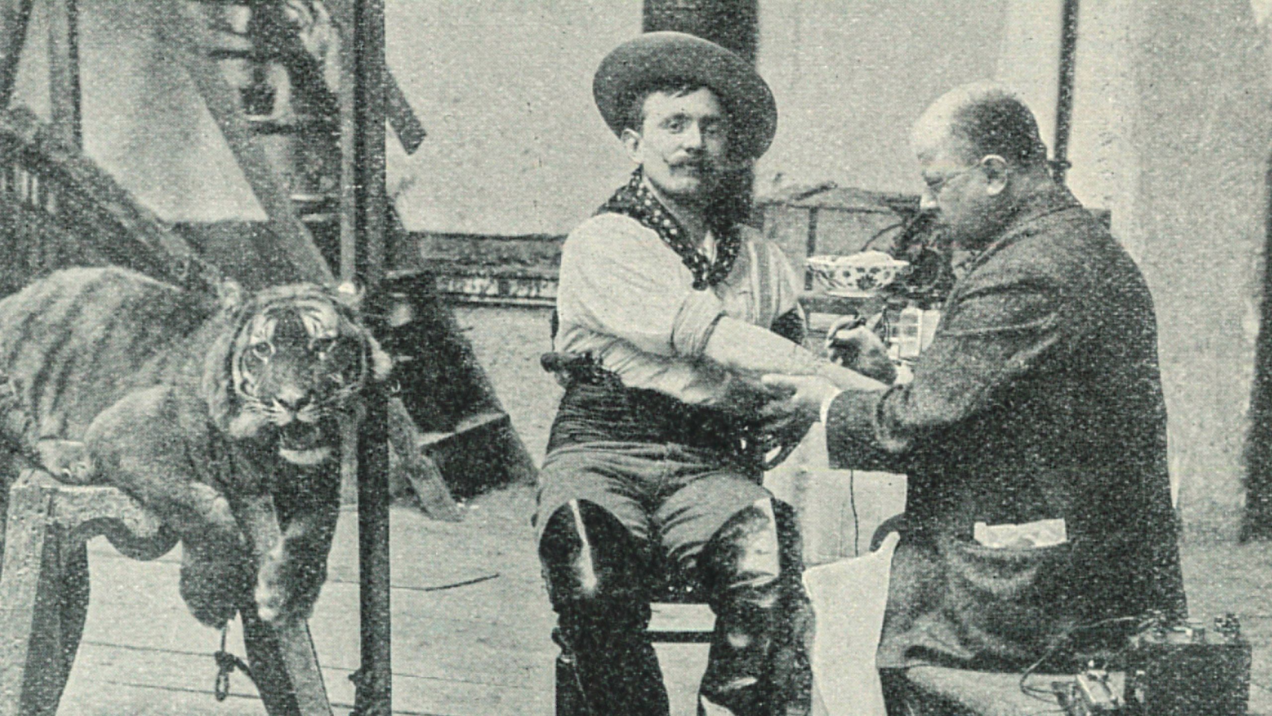 Alfred South tattooing a Viennese tiger tamer in a circus ring, courtesy of Dr Matt Lodder