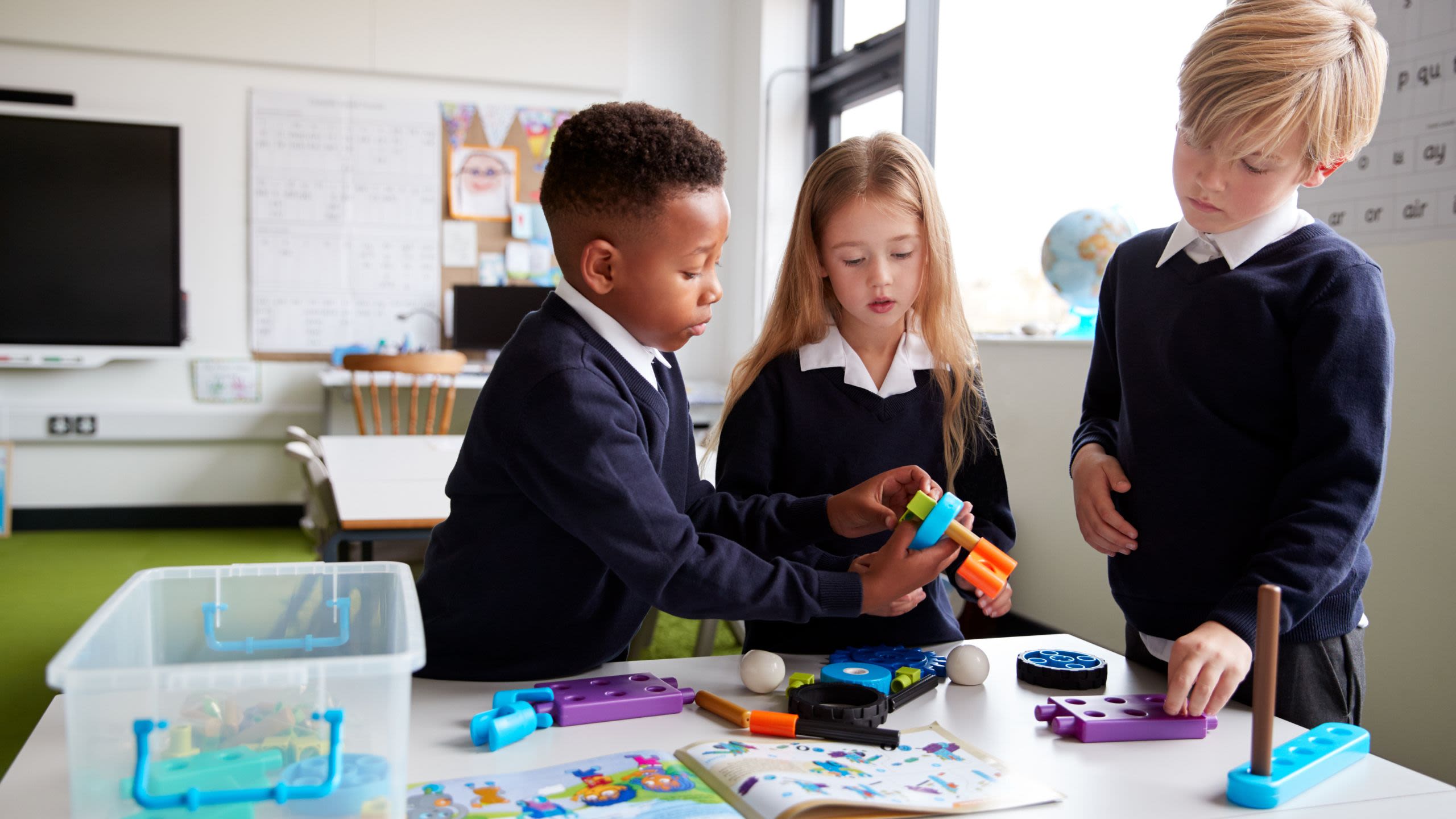 Children in school doing a craft activity