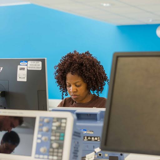 Student talking into a microphone