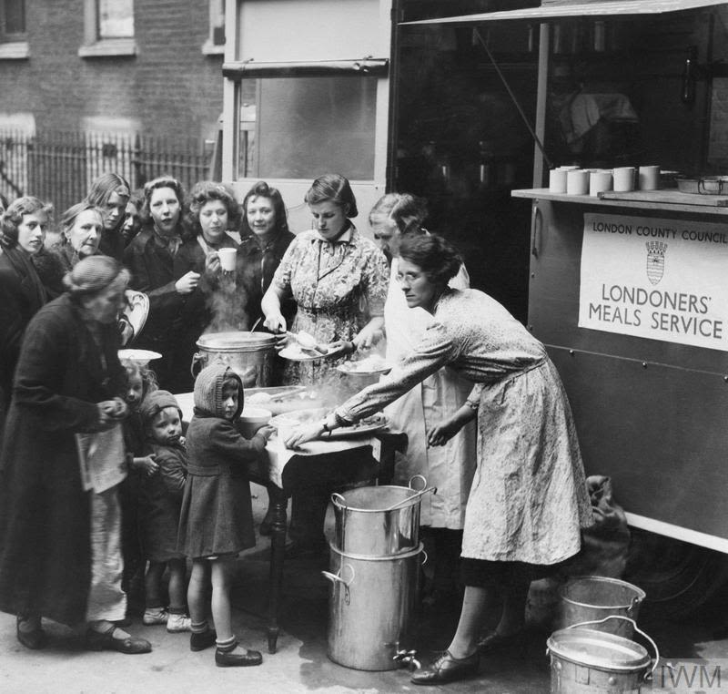 Archive photo of women handing out food at a soup kitchen in London during the Second World War, courtesy of the Imperial War Museum