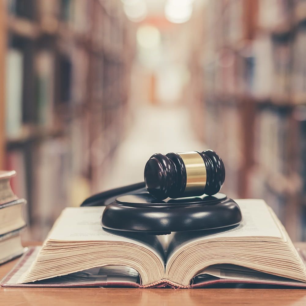 Gavel and hammer on top of a book