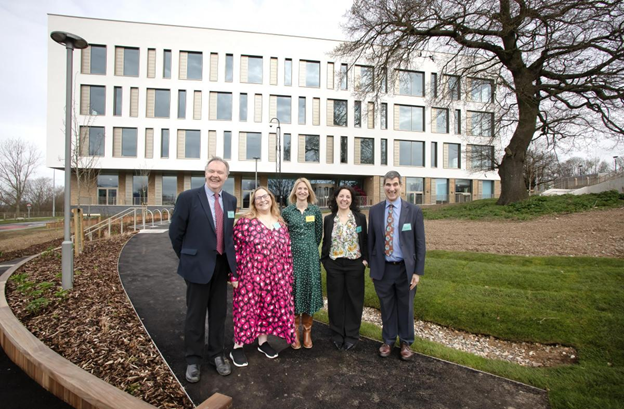 Health Wellbeing and Care Hub with members of staff outside