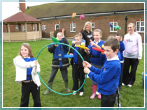 Pupils at Willow Brook Primary School with their outdoor play equipment