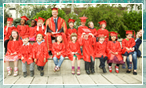 Vice-Chancellor Professor Colin Riordan with children from the day nursery