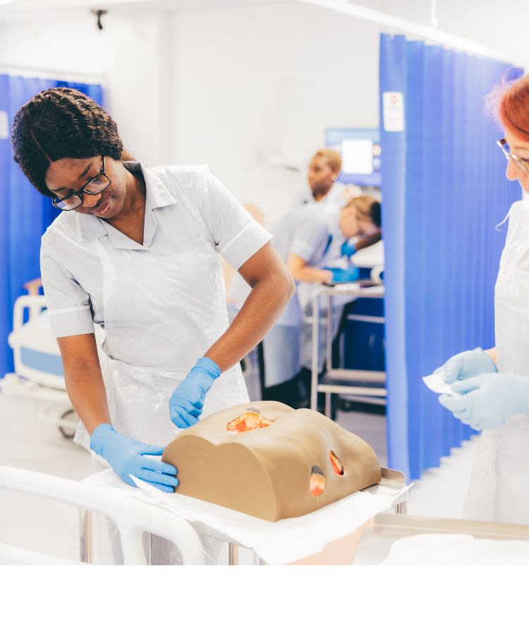 A nursing student in one of our realistic training environments