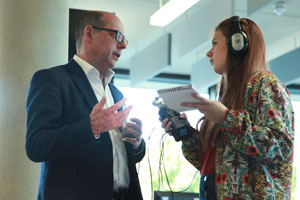The BBC's Nick Robinson speaks to one of the journalism students