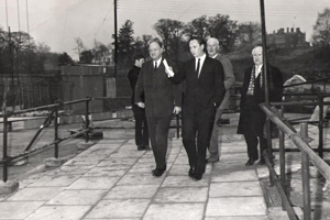 Professor Sir Albert Sloman shows Lord Butler around building works at the Colchester Campuis