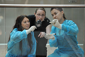 A lecturer and students during a forensic science activity