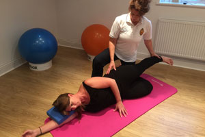Samantha Head (right) demonstrates the Modified Pilates technique with her physiotherapist colleague, Tanya Jewell.